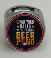 The deCAPitator GRAB YOUR BALLS WERE PLAYING BEER PONG Ring bottle cap and can tab opener! Ring sizes 6 to 15 with ring sizer. Box not included.