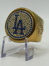 The LA deCAPitator ring bottle cap & can tab opener!