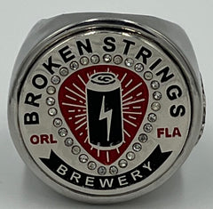 The deCAPitator Broken strings brewery ring bottle and can tab opener!