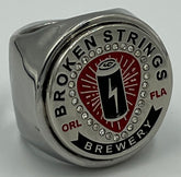The deCAPitator Broken strings brewery ring bottle and can tab opener!