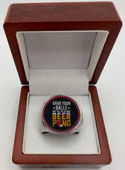 The deCAPitator GRAB YOUR BALLS WERE PLAYING BEER PONG Ring bottle cap and can tab opener! Ring sizes 6 to 15 with ring sizer. Box not included.