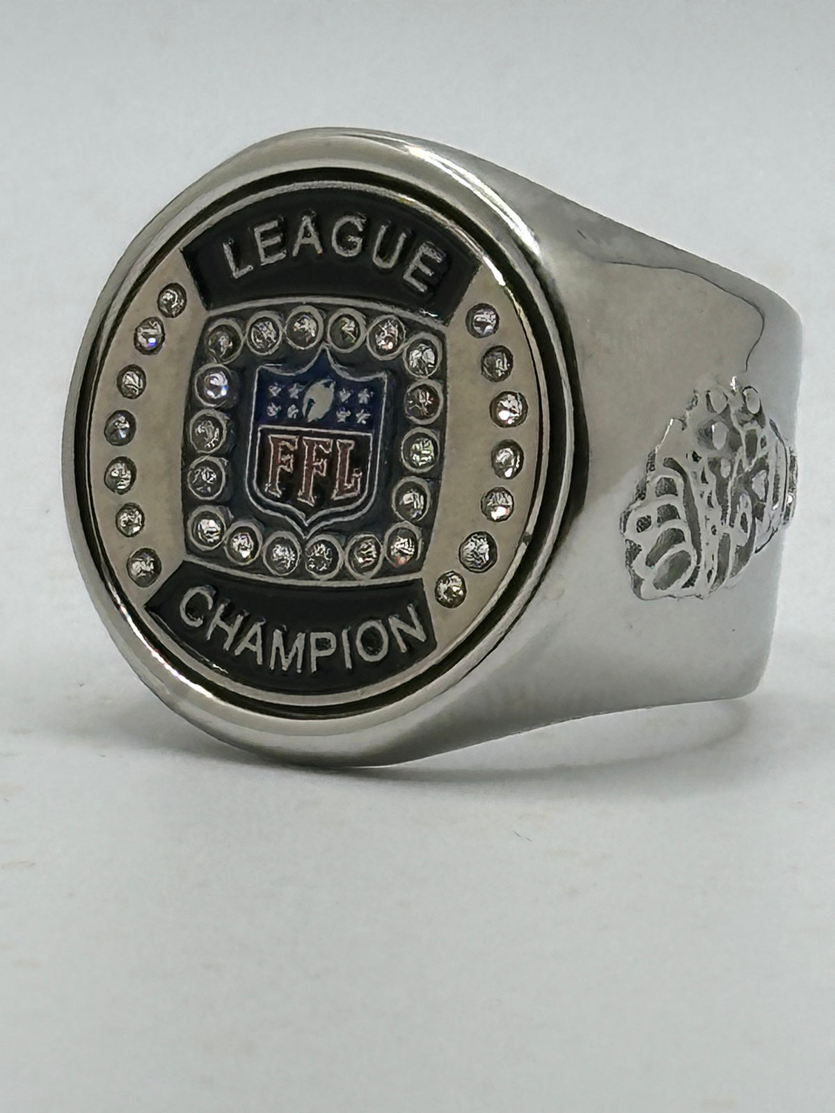 The deCAPitator Fantasy football League Championship Ring bottle cap and can tab opener!