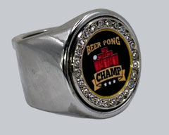 The deCAPitator BEER PONG CHAMP Ring bottle cap and can Ring goes on your middle finger for best leverage.