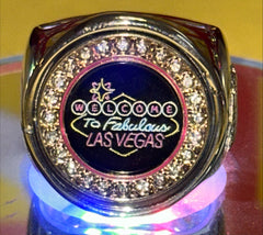 The Welcome to Las Vegas deCAPitator ring bottle cap and can tab opener!