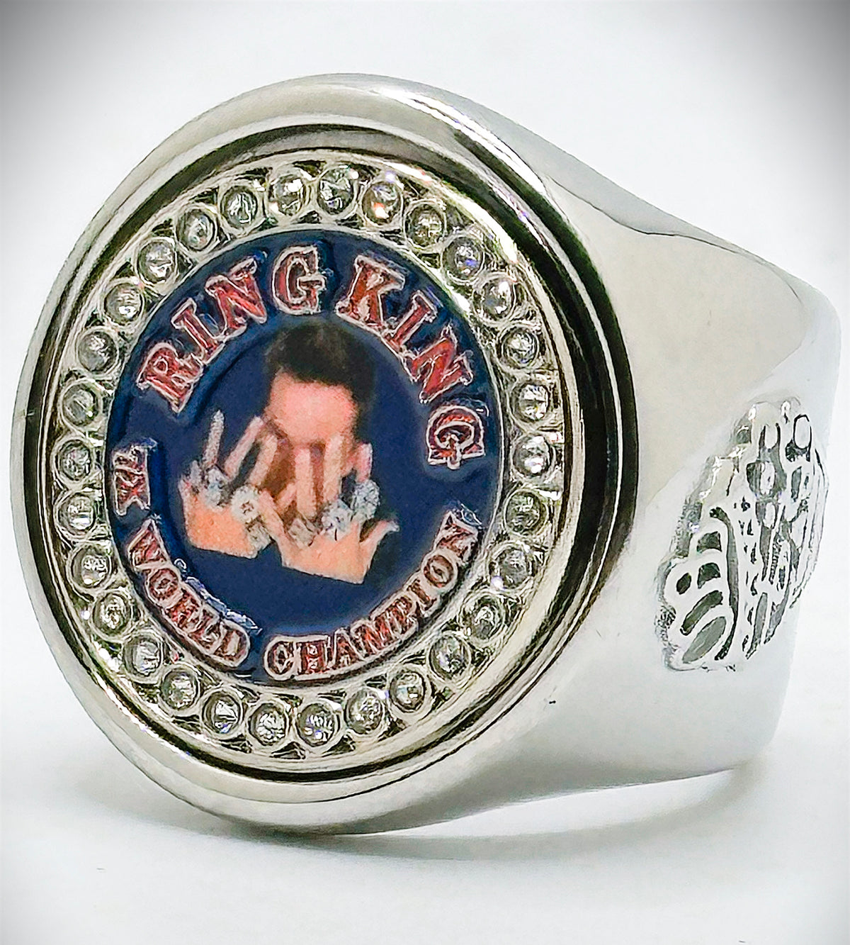 The Tom Brady Ring King 7X world champion deCAPitator ring bottle cap and can tab opener.